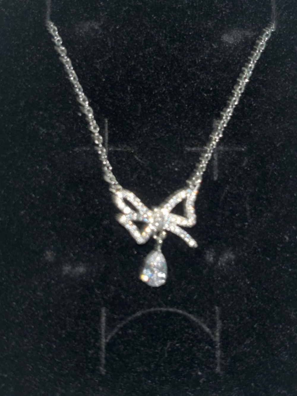 Anthropologie Silver Bow Pendant Necklace with Teardrop